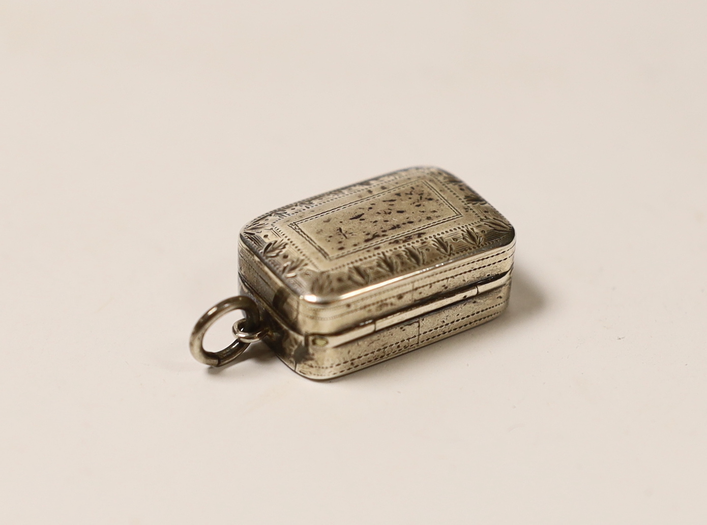 A George III engraved silver vinaigrette, Matthew Linwood, Birmingham, 1802, 23mm.